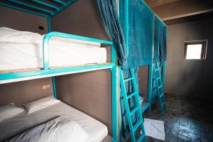 Ένα ή περισσότερα κρεβάτια σε δωμάτιο στο TT Premium Hostel Vientiane +40 φωτογραφίες