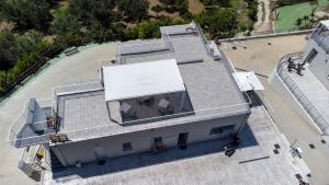 an overhead view of a building with a white sign on it at Villa Caravaggio Comfort e Relax in Rocca San Giovanni