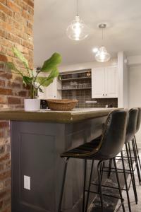 Η κουζίνα ή μικρή κουζίνα στο King and Queen Suite 1st Floor Sleeps 6 +20 φωτογραφίες