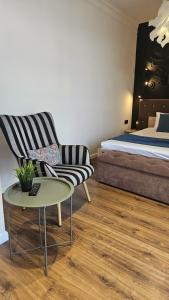 Posteľ alebo postele v izbe v ubytovaní Black Room Apartment
