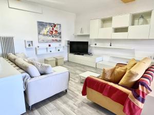 A seating area at Comodo appartamento Casa Razzoli