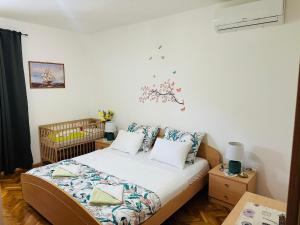 Postel nebo postele na pokoji v ubytování Apartment Josip