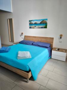 Postel nebo postele na pokoji v ubytování Il Vicoletto + 16 fotografií