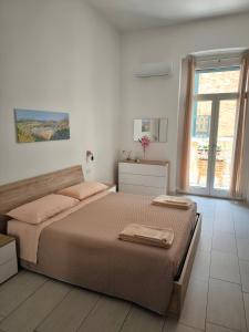 Postel nebo postele na pokoji v ubytování Il Vicoletto