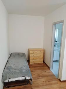 Posteľ alebo postele v izbe v ubytovaní Ubytovanie s kuchynkou