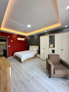 Postel nebo postele na pokoji v ubytování Renaissance Apart Hotel