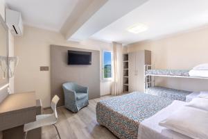 Postel nebo postele na pokoji v ubytování Hotel Sole