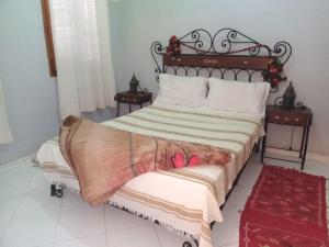 APPART AIGLE HOTEL客房内的一张或多张床位