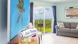 Posezení v ubytování Sunrise Sanctuary - Top Floor Ocean Pointe 2415