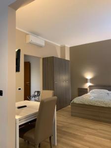 Postel nebo postele na pokoji v ubytování ALBERGO LOCANDA DIANA