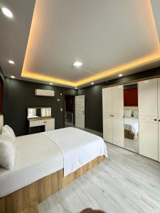 Kuchyň nebo kuchyňský kout v ubytování Renaissance Apart Hotel