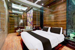 Townhouse Oak Swaroop Nagarにあるベッド