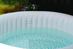 a close up of a bowl of water on a table at Myrtle in Badsey