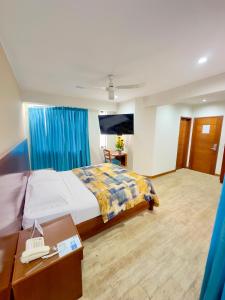 Postel nebo postele na pokoji v ubytování Hotel Esencia Suites