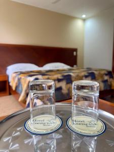 Postel nebo postele na pokoji v ubytování Hotel Esencia Suites