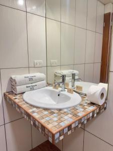Koupelna v ubytování Hotel Esencia Suites