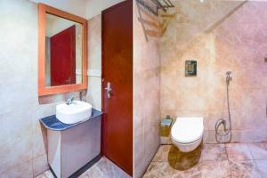 Ένα μπάνιο στο Townhouse Oak Ranthambore Road +29 φωτογραφίες