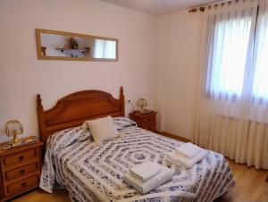 Postel nebo postele na pokoji v ubytování Peña Telera