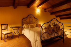 Postel nebo postele na pokoji v ubytování Agriturismo Trerè