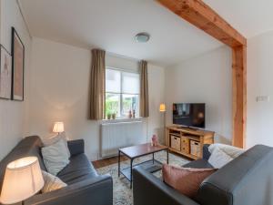 TV a/nebo společenská místnost v ubytování Holiday Home Callantsoog near Beach