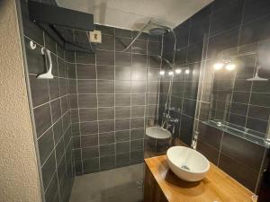 Koupelna v ubytování Appartement terrasse avec vue exceptionnelle + 10 fotografií