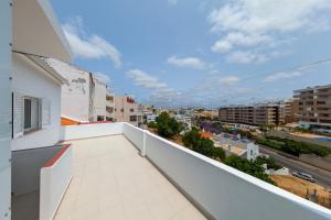 a balcony with a view of a city at Abrotea Apartments in Lagos