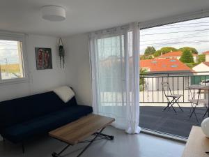 Posezení v ubytování T3 duplex vue mer