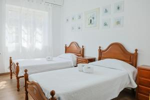 Postel nebo postele na pokoji v ubytování Albergue de São Bento + 37 fotografií