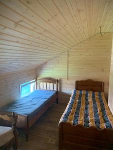 Postel nebo postele na pokoji v ubytování Guest house sofia