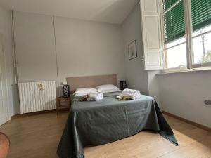 Postel nebo postele na pokoji v ubytování BINARIO 5