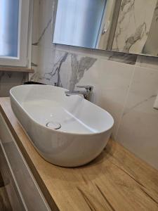 Koupelna v ubytování White apartment + 1 fotografie