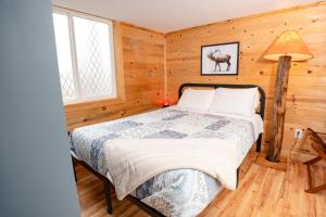 Voodi või voodid majutusasutuse WeeCasa Tiny Home Resort toas