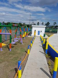 a playground with colorful equipment in a park at Apartment in Montenegro in Montenegro