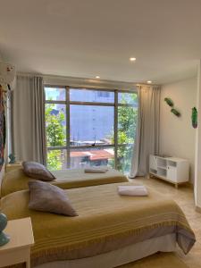 Ένα ή περισσότερα κρεβάτια σε δωμάτιο στο Tacha +130 φωτογραφίες