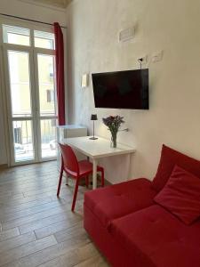 TV a/nebo společenská místnost v ubytování Sea View Teti Rooms & Apts