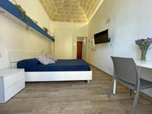 Televízia a/alebo spoločenská miestnosť v ubytovaní Sea View Teti Rooms & Apts + 37 fotografií