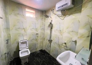 Koupelna v ubytování Sandakada Homestay