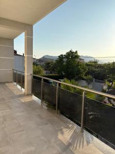a balcony of a building with a view at Shkodra Rooms in Shkodër