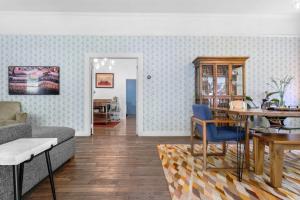 a living room with a couch and a table at Wine Country Retreat with Pool & Hot Tub - Dogs OK in Guerneville +58 photos