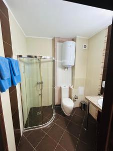 Et badeværelse på Private Apartments in Primea Beach Residence