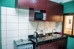Kuchyň nebo kuchyňský kout v ubytování Residence JTC