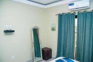 Postel nebo postele na pokoji v ubytování Residence JTC