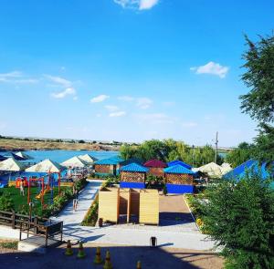 an aerial view of a park with a playground at Boat Station in Kapchagay