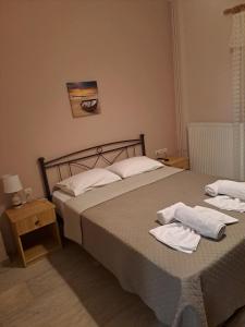Posteľ alebo postele v izbe v ubytovaní P.A.G Apartments
