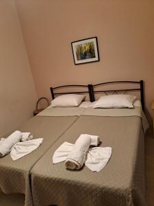 Posteľ alebo postele v izbe v ubytovaní P.A.G Apartments