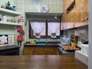 a kitchen with a sink and a counter top at Casa Massó in Anserall