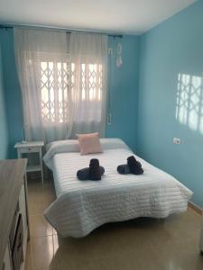 Ένα ή περισσότερα κρεβάτια σε δωμάτιο στο Bajo del Montsià con Piscina +3 φωτογραφίες