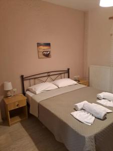 Posteľ alebo postele v izbe v ubytovaní P.A.G Apartments