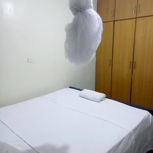 Postel nebo postele na pokoji v ubytování Mileslin Homes