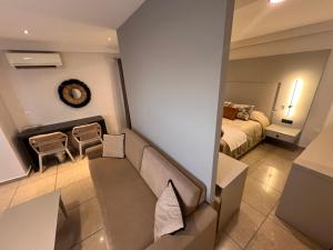 Theoxenia Caldera Hotel客房内的一张或多张床位